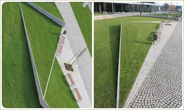 Дорожка из брусчатки и газоны в каменных рамах