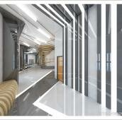 коридор дизайн-центра, серые оттенки на полу и стенах, справа на стене вертикальные конструкции из стекла с подсветкой, на полу диагональная разбивка, ассиметричная линия с подсветкой, слева у стены лавочка из каркасных брусков дерева, светильники продолжают линию пола.